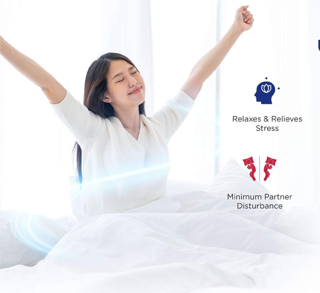 Woman enjoying restful sleep on Dunlopillo mattress
